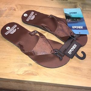 Brown leather flip flops
